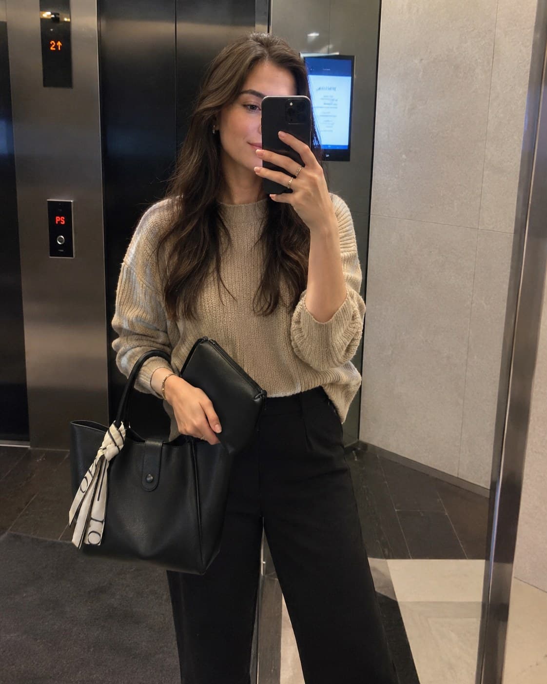 Heading up to the office with the Everyday Tote in Noir